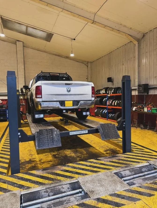 Pickup truck positioned on the Top Plant Garage test lane